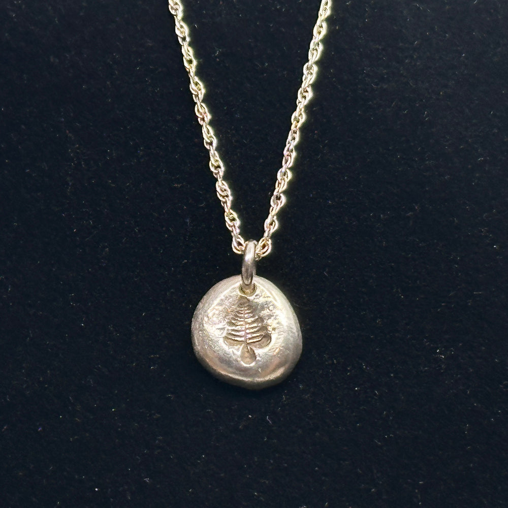 Patagonian Hands's Fine Silver (.999) Tree Necklace on a Sterling Silver (.925) Chain, detail