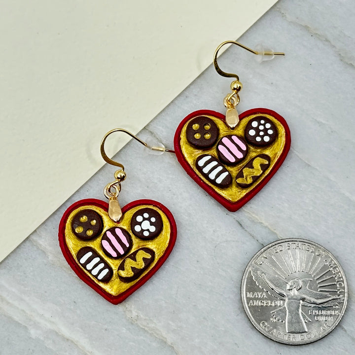 Pair of Bitterroot Shining Creations' Valentine Earrings (chocolate box), with scale