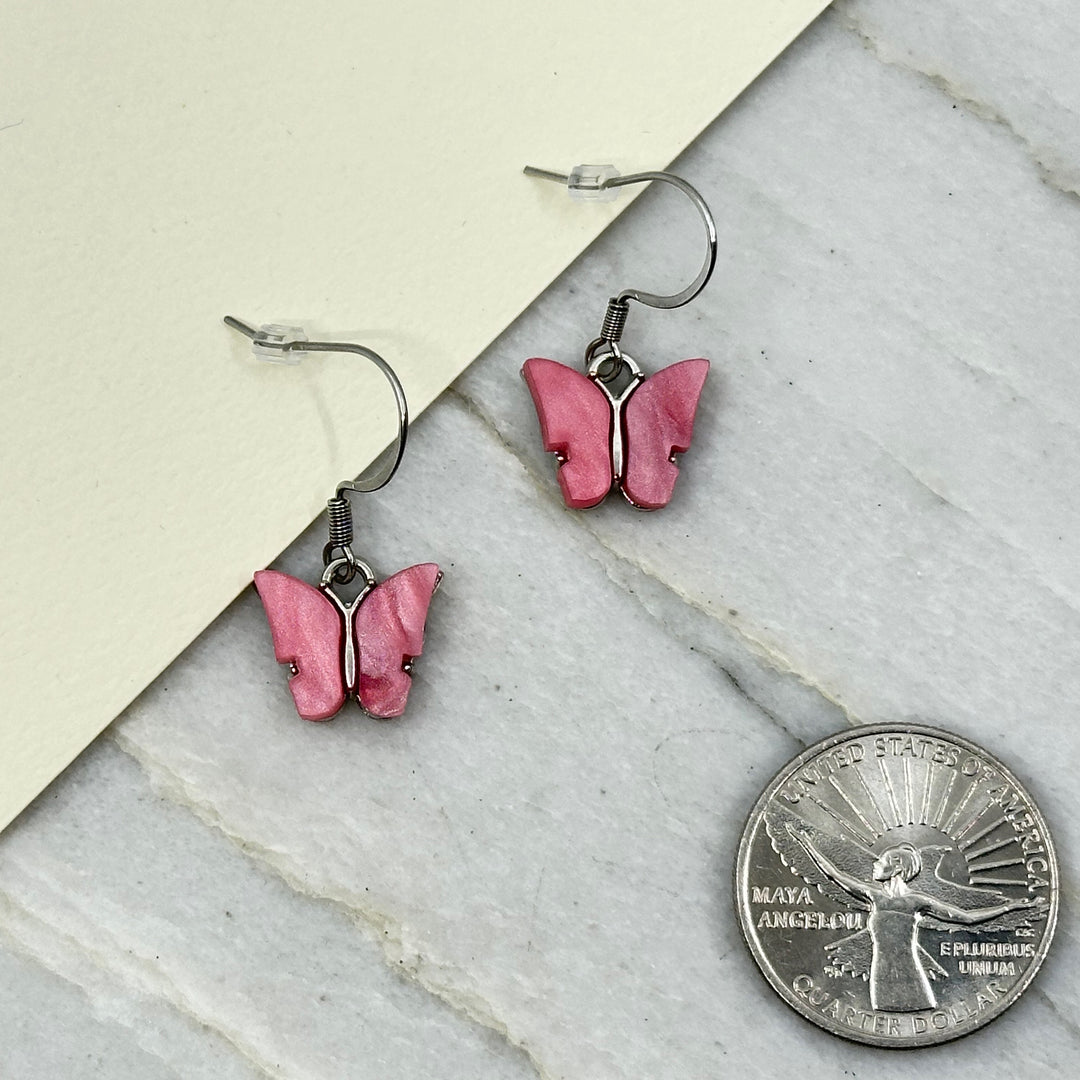 Pair of Butterfly Earrings with Stainless Steel Wires by Woodland Goth Creations, pink w/ scale