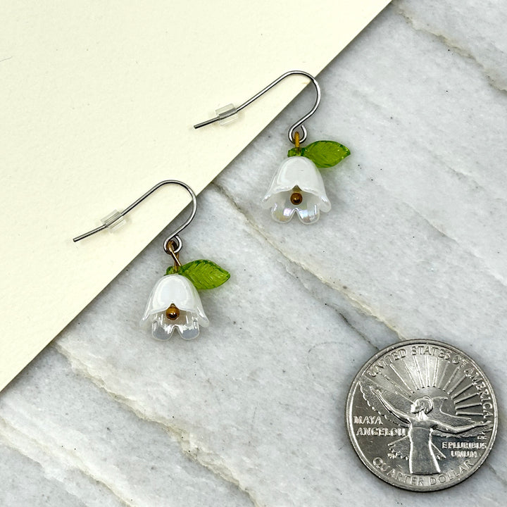 Pair of Iridescent Flower Earrings with iron ear wires by Woodland Goth Creations, white w/ scale