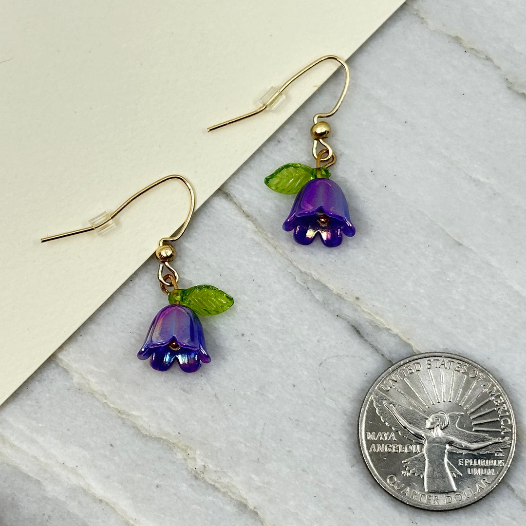 Pair of Iridescent Flower Earrings with iron ear wires by Woodland Goth Creations, purple w/ scale