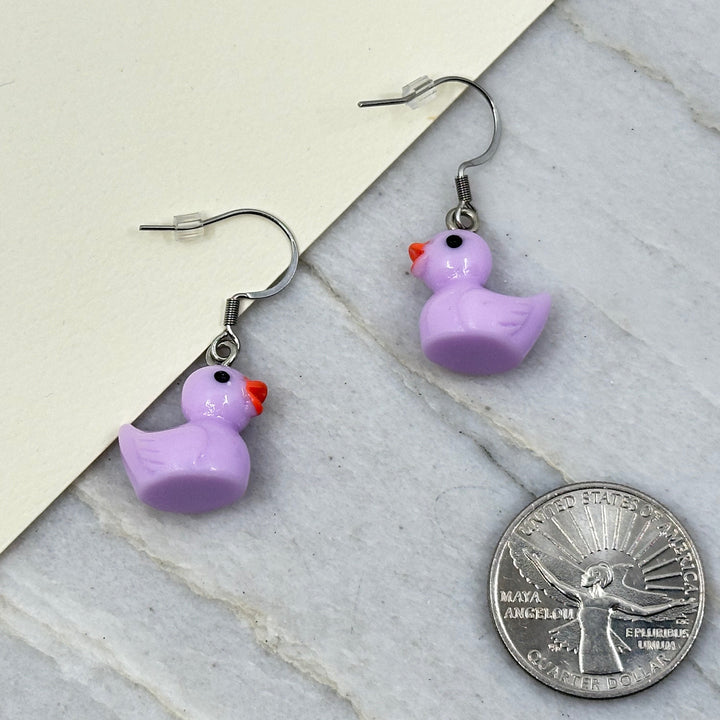 Pair of Duck Earrings with Stainless Steel Ear Wires by Woodland Goth Creations, purple w/ scale