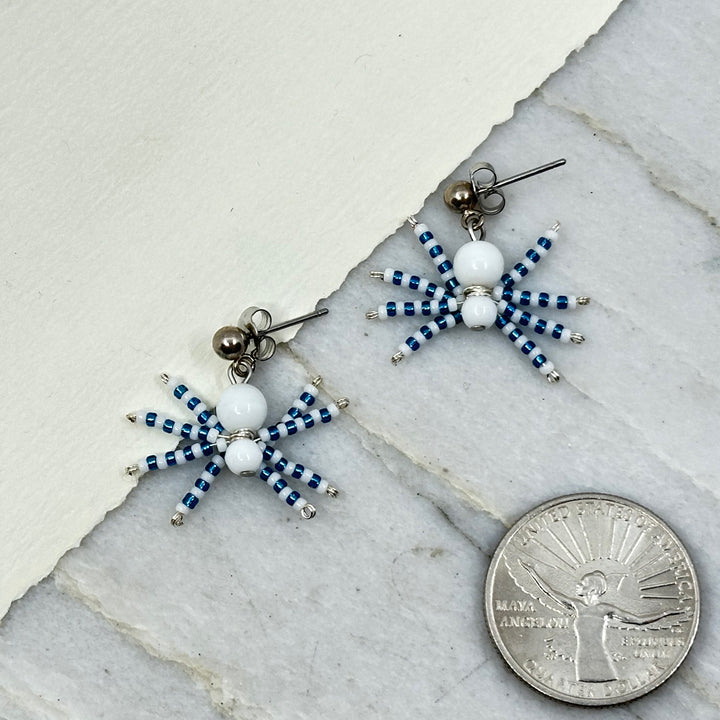 Pair of Spider Beaded Earrings with Stainless Steel Studs by Aurum Shimmer (blue and white), with scale