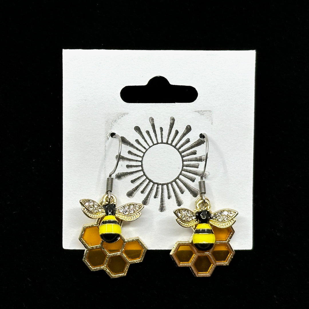 Pair of Bee On Honeycomb Earrings with Stainless Steel Wires by Woodland Goth Creations, on card