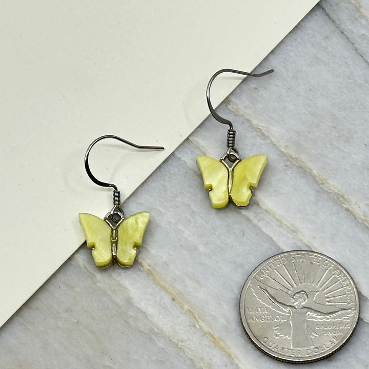 Pair of Butterfly Earrings with Stainless Steel Wires by Woodland Goth Creations (yellow), with scale