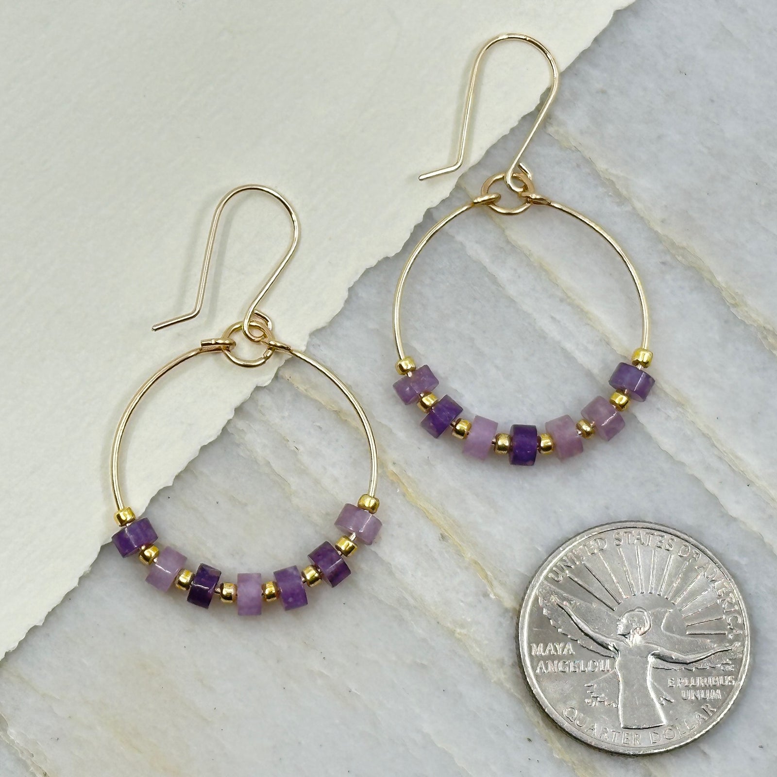 Pair of Bijou by Sam's Gold Hoop Earrings with Amethyst Gemstones, with scale