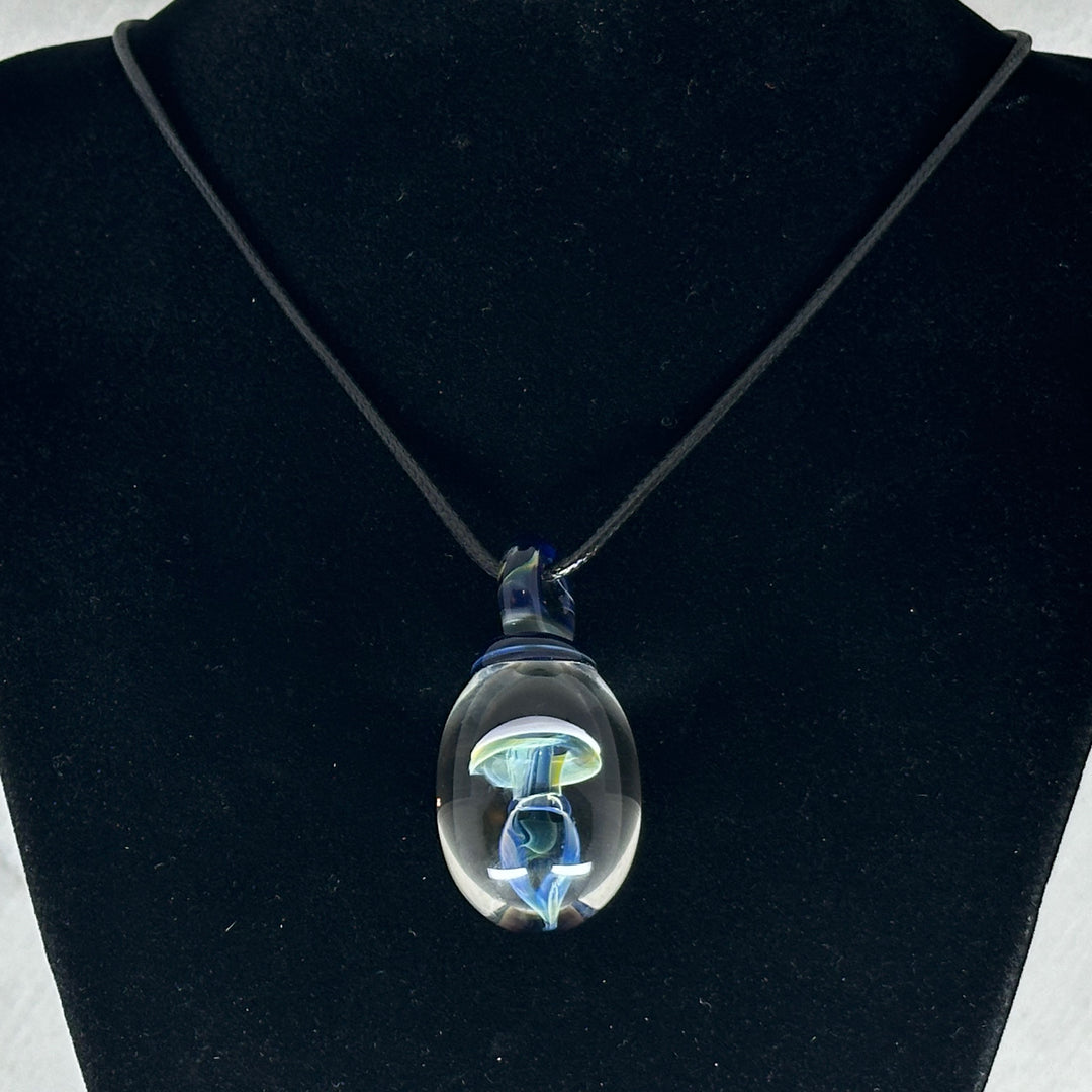 Hand Blown Mushroom Pendant (borosilicate lampwork) by Blue Flame Glass on cord (single mushroom, white cap and blue), hanging