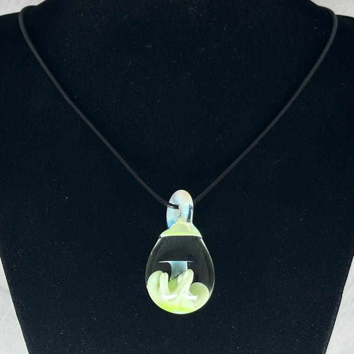 Hand Blown Mushroom Pendant (borosilicate lampwork) by Blue Flame Glass on cord (single mushroom, black cap and light green grass), hanging