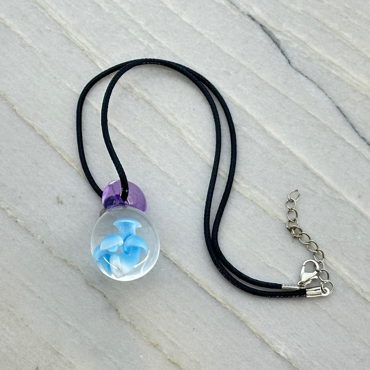 Hand Blown Mushroom Pendant (borosilicate lampwork) by Blue Flame Glass on cord (4 mushrooms, light blue and white)