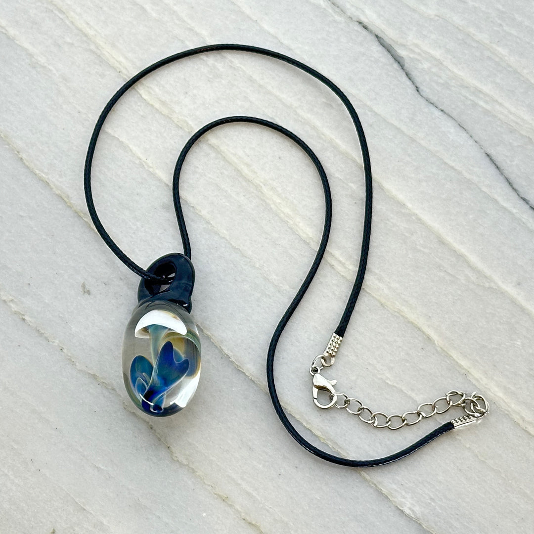 Hand Blown Mushroom Pendant (borosilicate lampwork) by Blue Flame Glass on cord (2 mushrooms, white cap and blue)