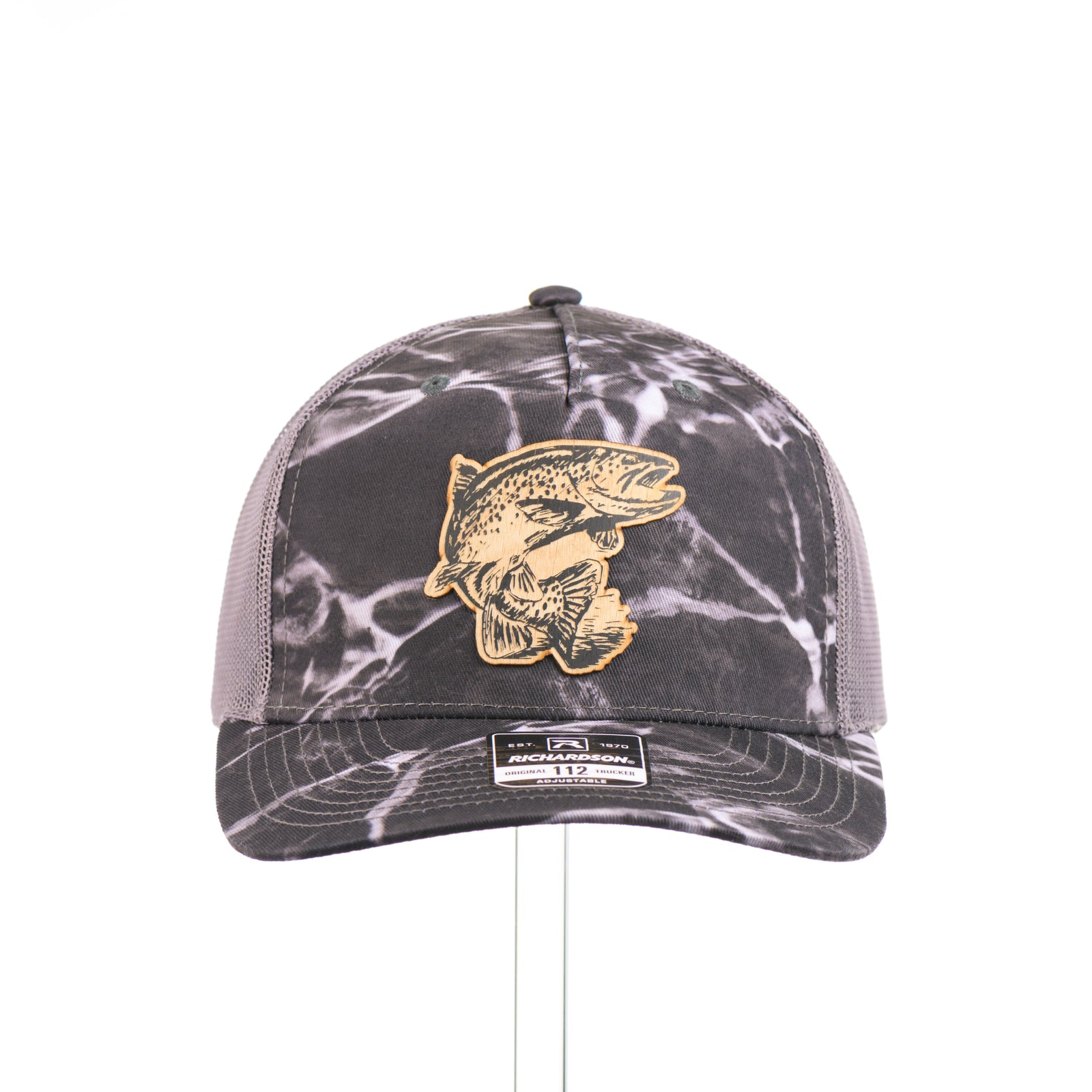 Flexwood Jumping Trout Richardson Trucker Cap featuring a premium flexwood patch in the shape of a jumping trout, handmade in Montana, USA by Last Best Supply Co.