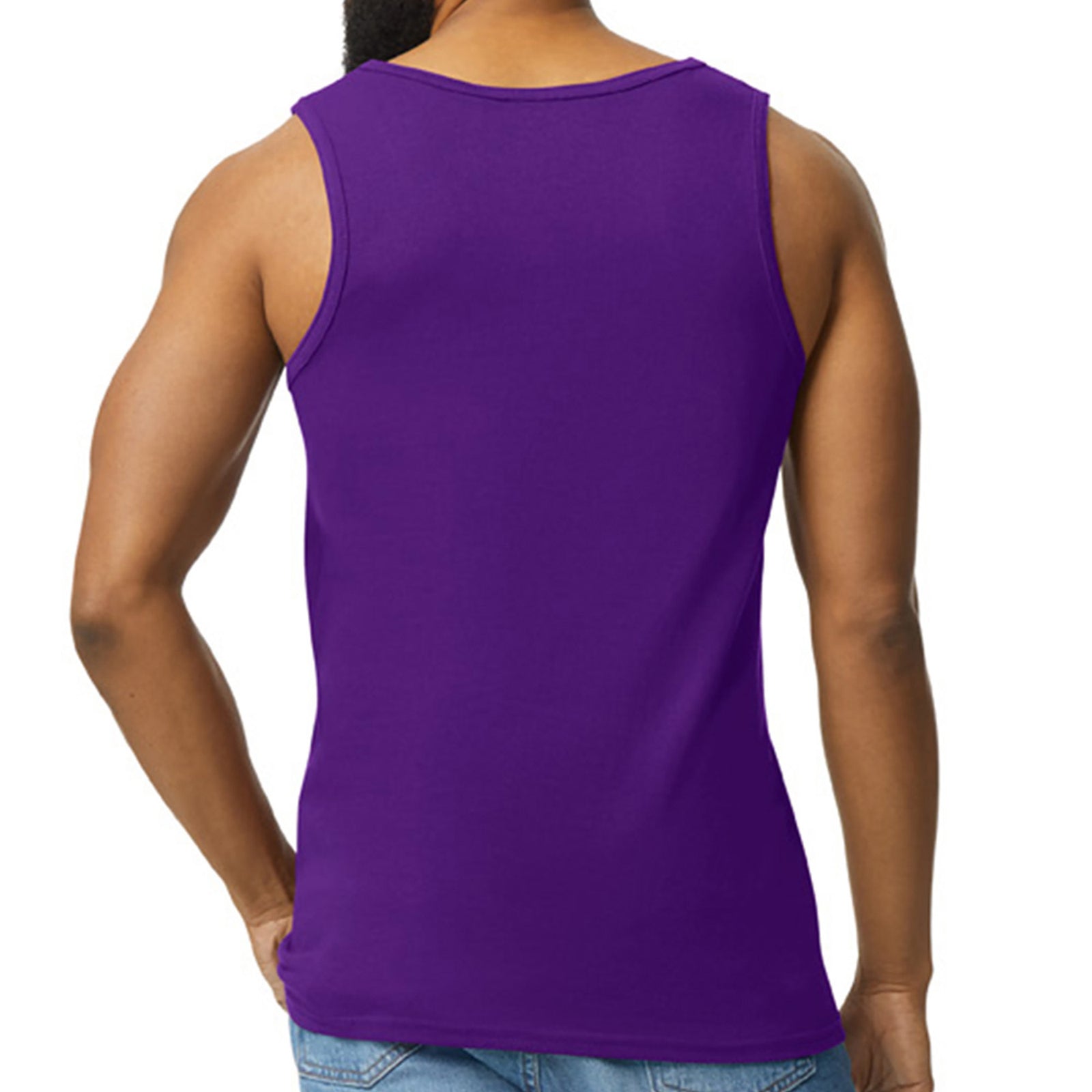 The back of a purple tank top on a male model for the 2025 Missoula Pride design.