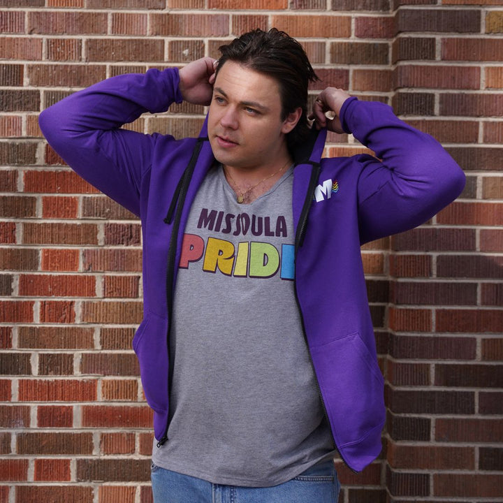 Missoula Pride 2025 Unisex Zip-up Hoodie featuring the 2025 Missoula Pride design by local artist T.Lyle, designed and decorated in Missoula, MT, USA