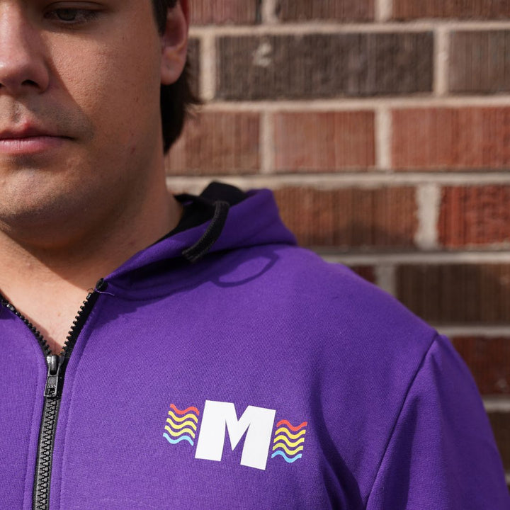 Missoula Pride 2025 Unisex Zip-up Hoodie featuring the 2025 Missoula Pride design by local artist T.Lyle, designed and decorated in Missoula, MT, USA