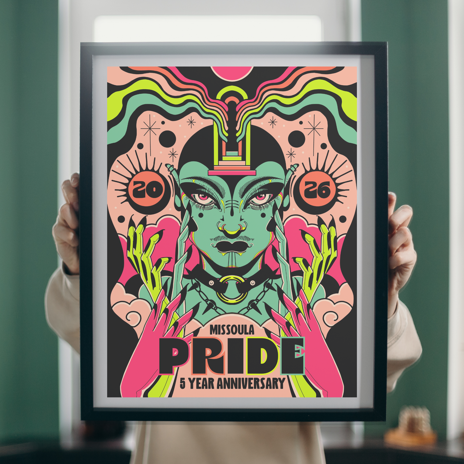 Framed poster with a colorful print featuring the 2026 Missoula Pride 5 year anniversary design