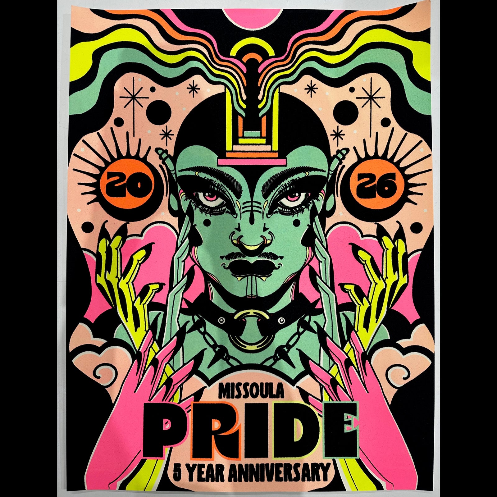 Colorful poster celebrating Missoula Pride 5 Year Anniversary with abstract designs and text.