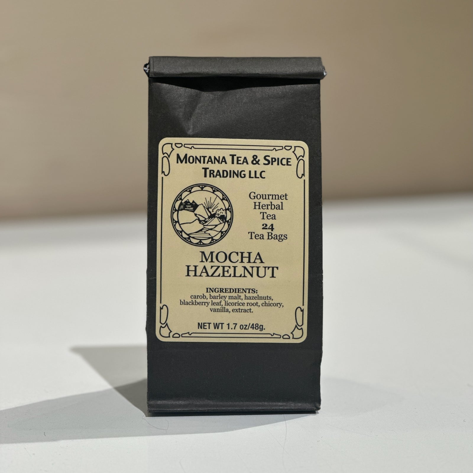 A black bag of tea with a label reading Mocha Hazelnut and Montana Tea & Spice Trading LLC