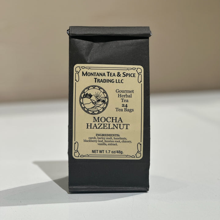 A black bag of tea with a label reading Mocha Hazelnut and Montana Tea &amp; Spice Trading LLC