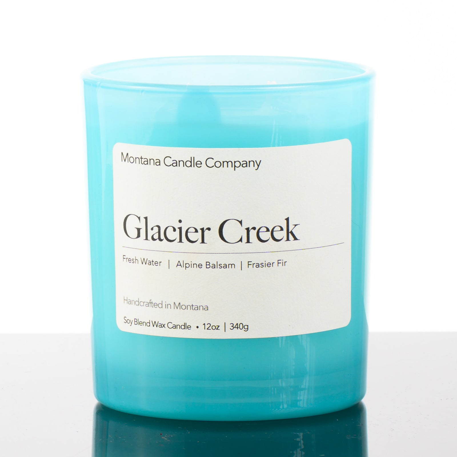 Glacier Creek Candle soy blend candle handmade in Missoula, Montana by Montana Candle Company, with a fresh alpine scent, 12 oz. glass tumbler