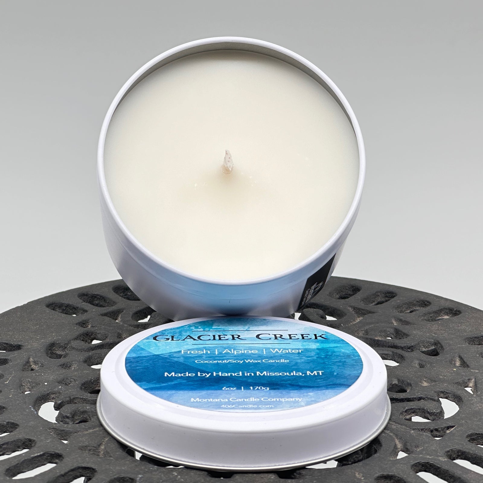 Glacier Creek Candle soy blend candle handmade in Missoula, Montana by Montana Candle Company, with a fresh alpine scent, 6 oz. tin