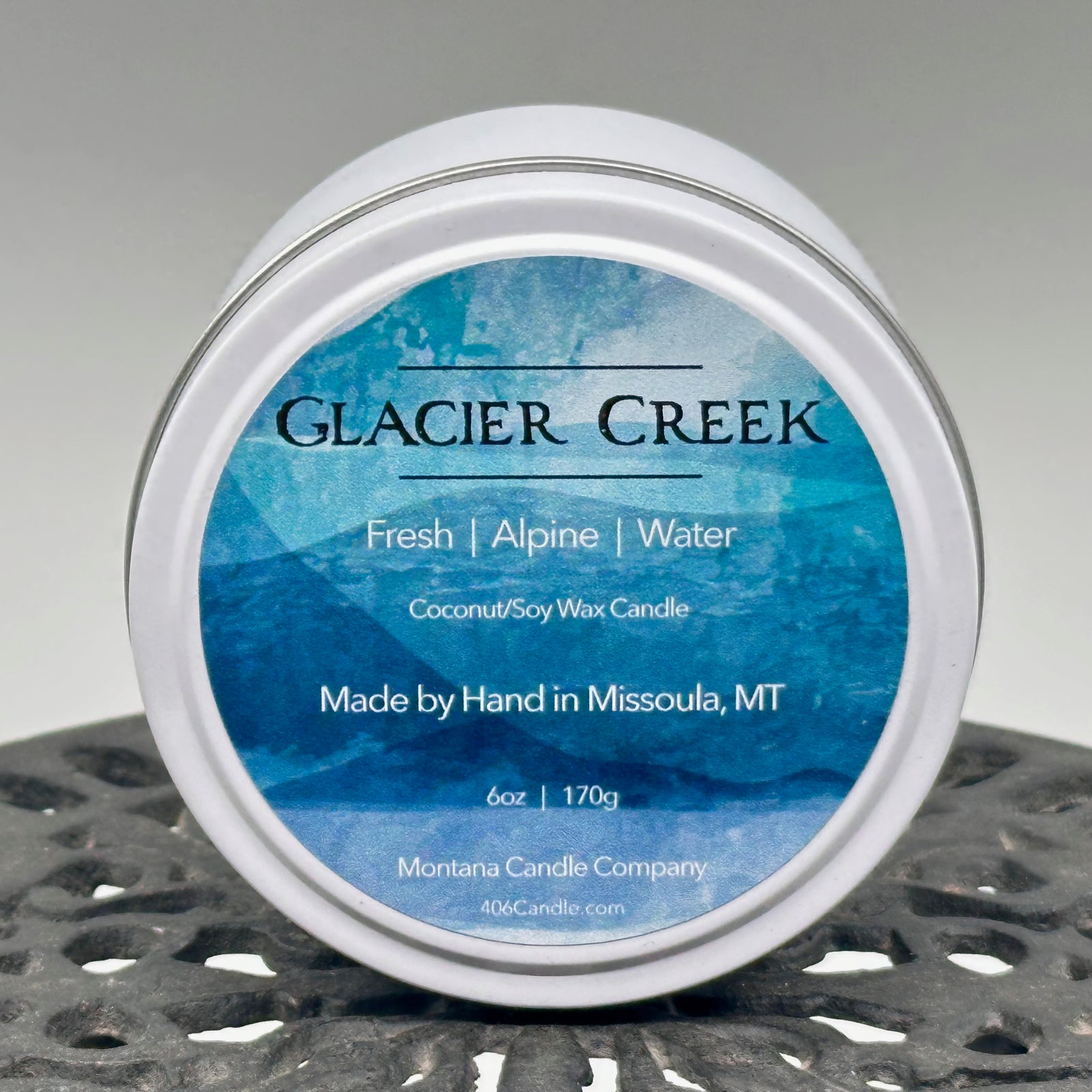 Glacier Creek Candle soy blend candle handmade in Missoula, Montana by Montana Candle Company, with a fresh alpine scent, 6 oz. tin