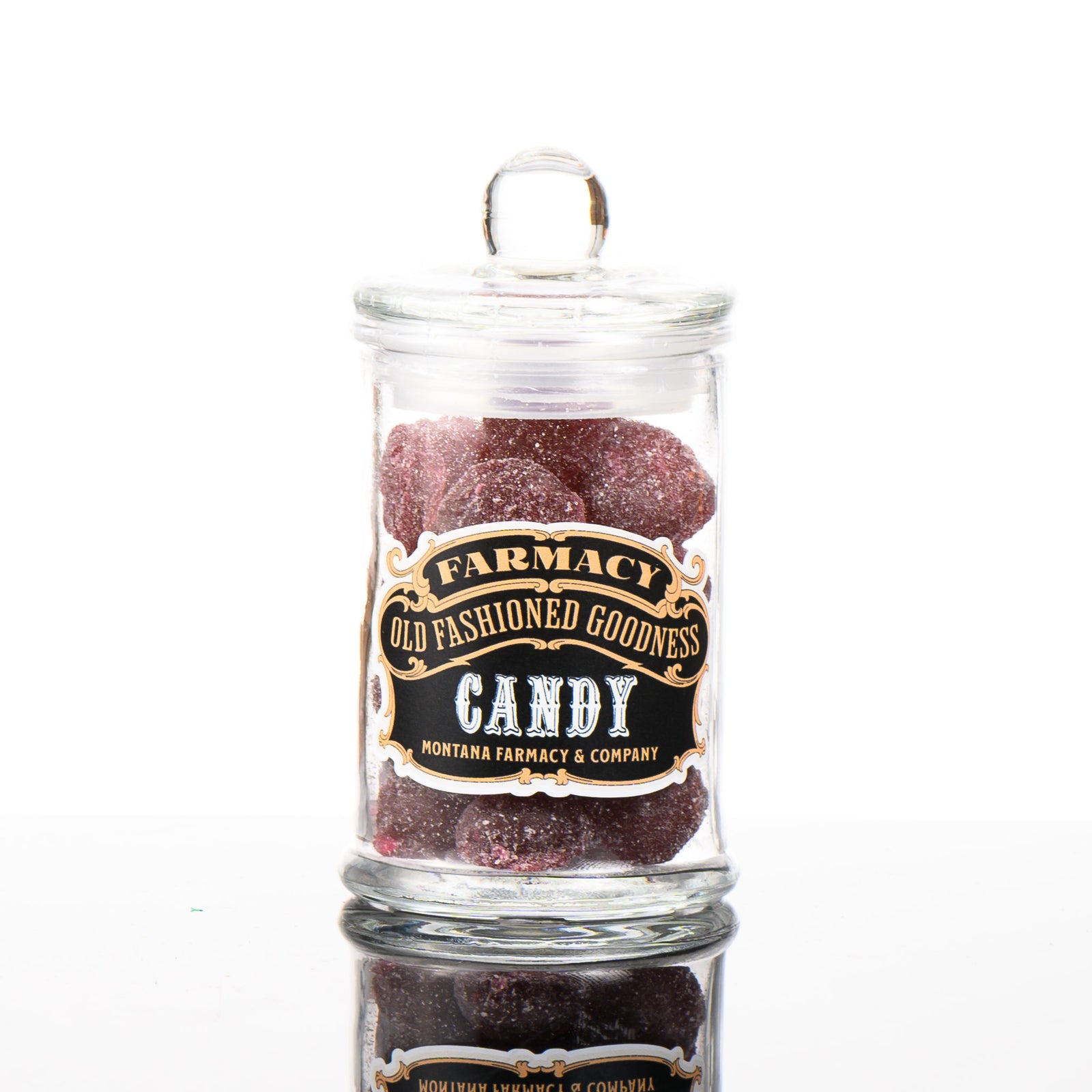 Montana Farmacy Old Fashioned Goodness Candy--Huckleberry Hard Candy--in a glass jar, front