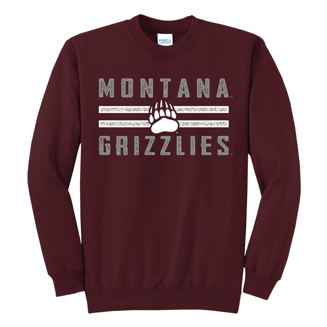 A maroon crewneck sweatshirt printed with the words, Montana Grizzlies in grey and a paw and white stripes.