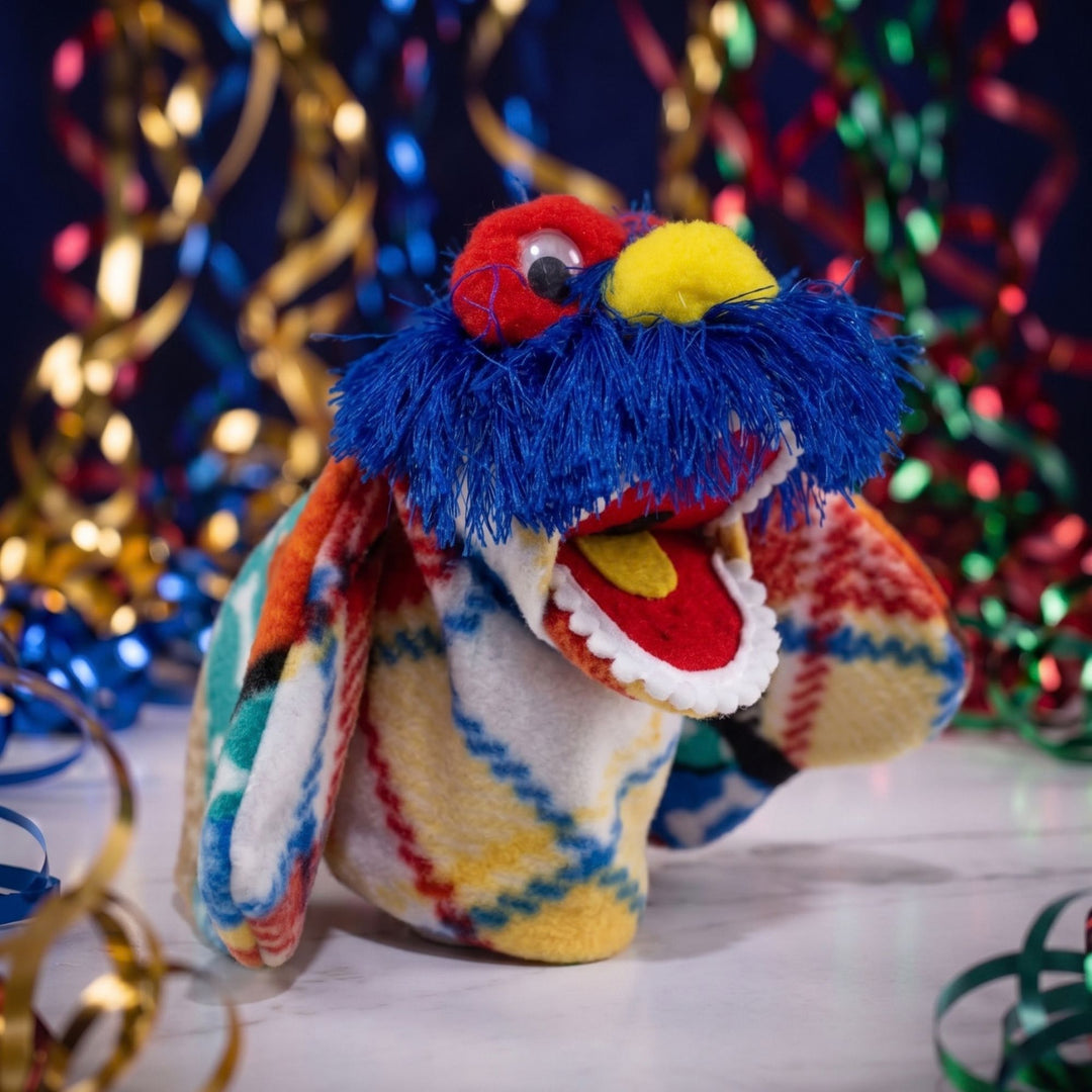 Bring play to life with the Dogadile Handmade Puppet from Puppet Pandemonium. Handcrafted in Montana with vibrant fleece for endless creative fun!