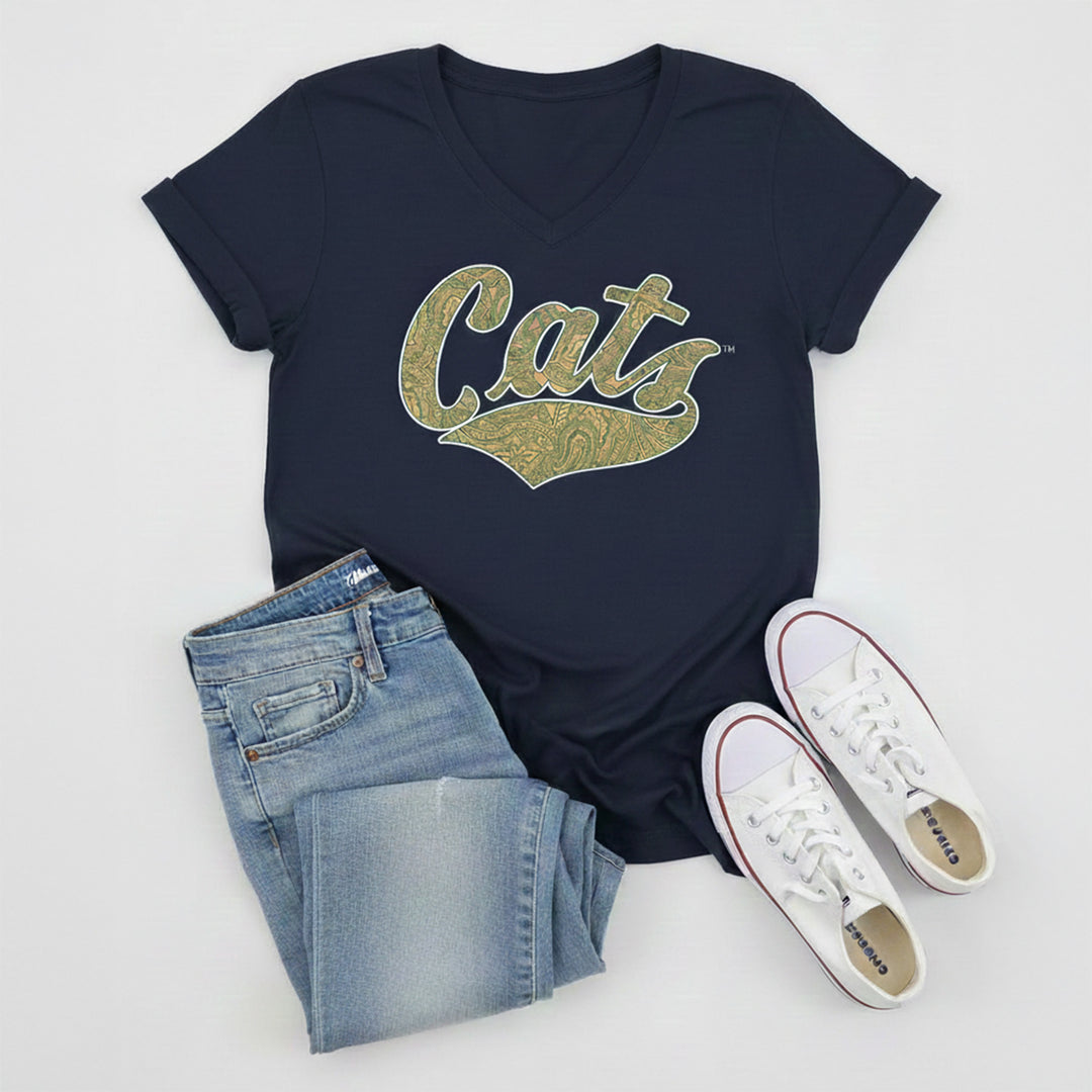 Navy t-shirt with 'Cats' print, blue jeans, and white sneakers on a light gray background