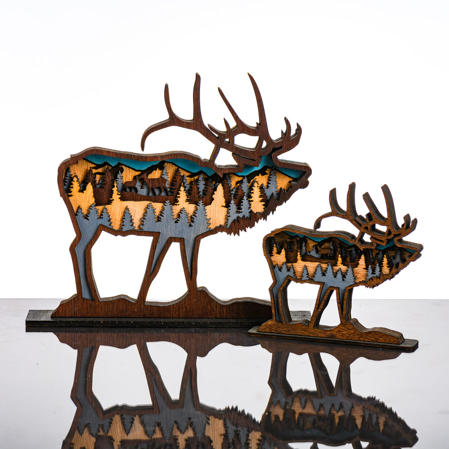 Elk 3D Layered Wood Art made in Montana by RJS Engraving & Design - laser-cut wood art depicting trees and mountains inside the silhouette of an elk, 2 sizes