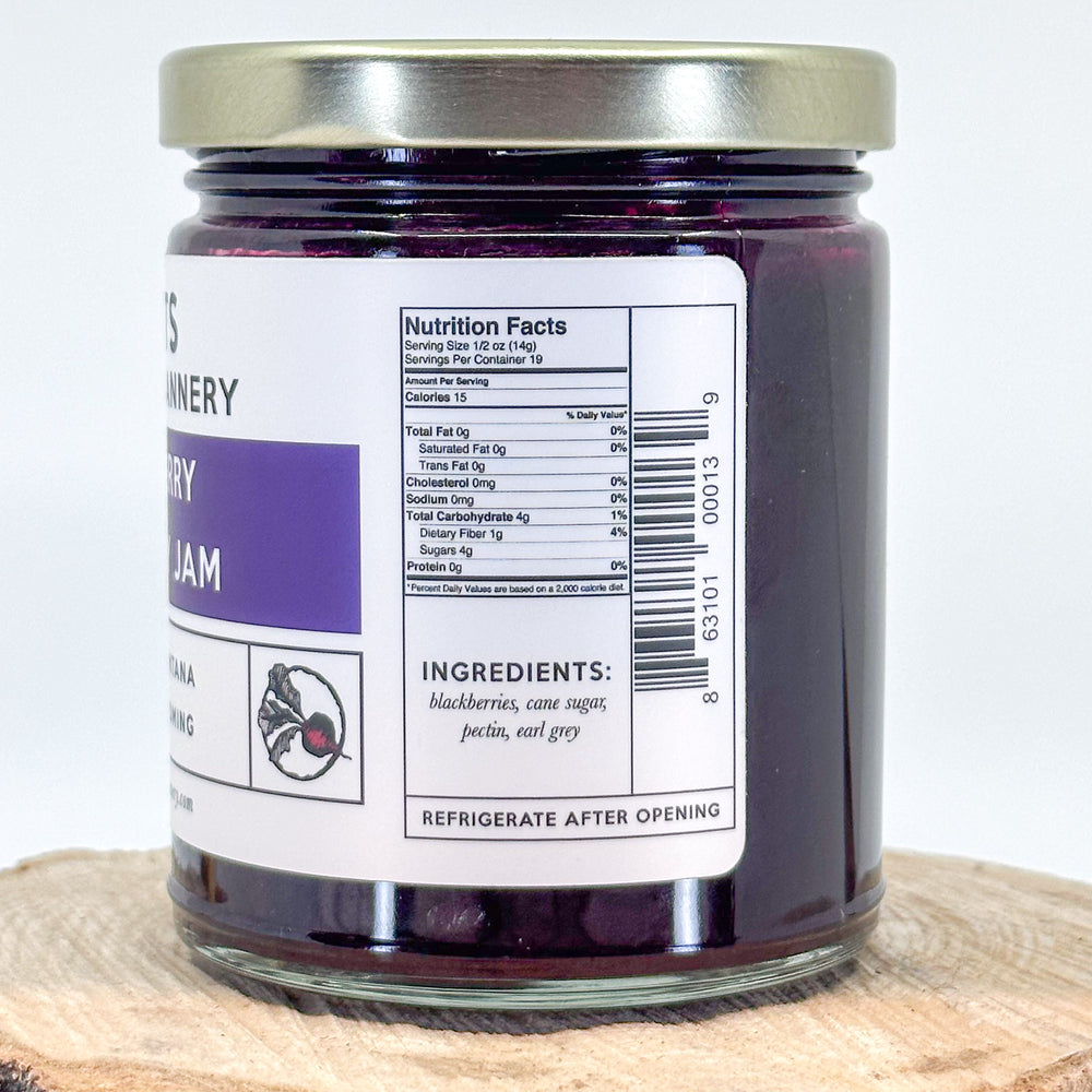 The side of the Blackberry Earl Grey Jam with the nutrition facts and ingredients. ngredients are blackberries, cane sugar, pectin, earl grey