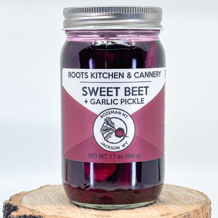 A 17oz jar of sweet beet and garlic pickles made by Roots Kitchen & Cannery