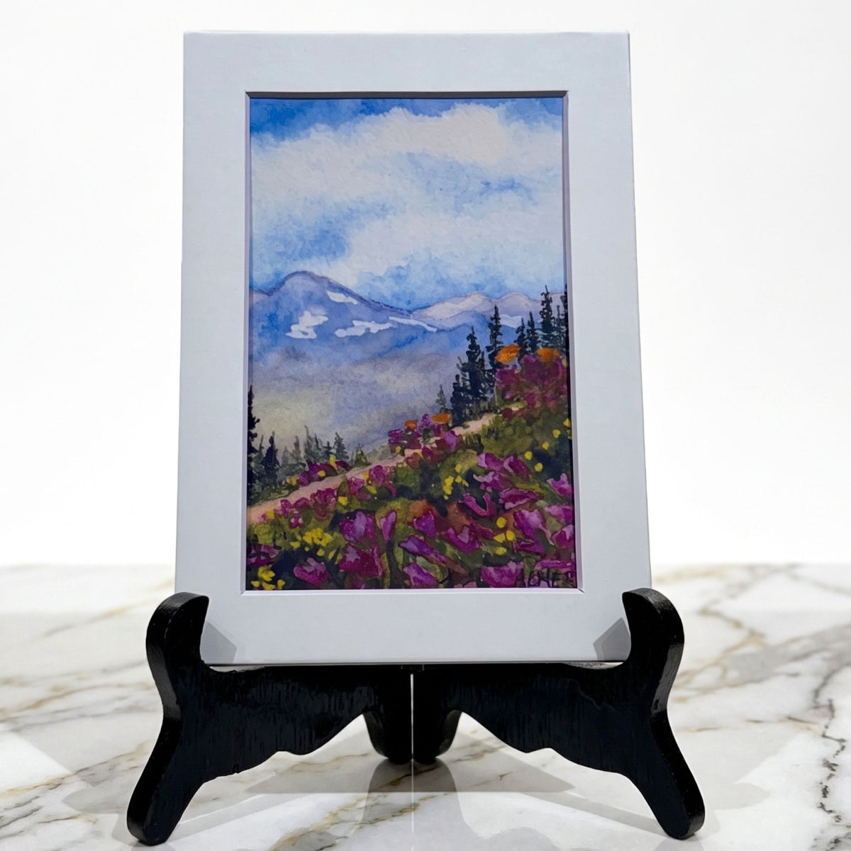 Bring alpine beauty home with the Rocky Mountain Flora 5x7 matted print by Stark Mountain Studio. Vibrant watercolor mountain artwork. Made in Montana, USA.
