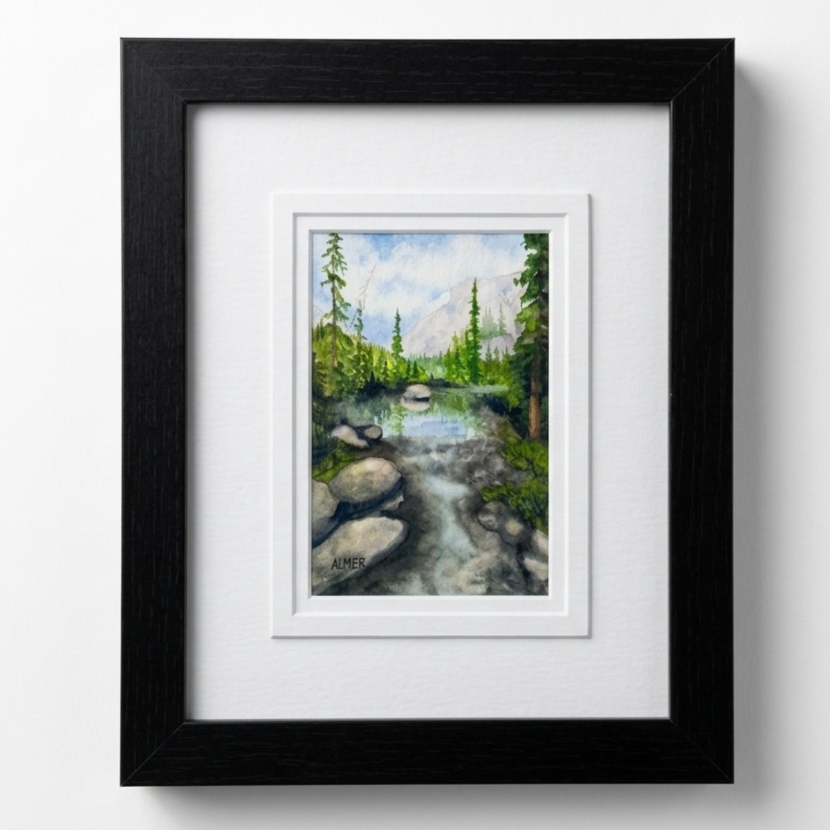 Bring home the Blodgett Creek Original Watercolor Painting by Stark Mountain Studio. Beautifully framed in a 9.5x11.5 black frame. Made in Montana & USA.