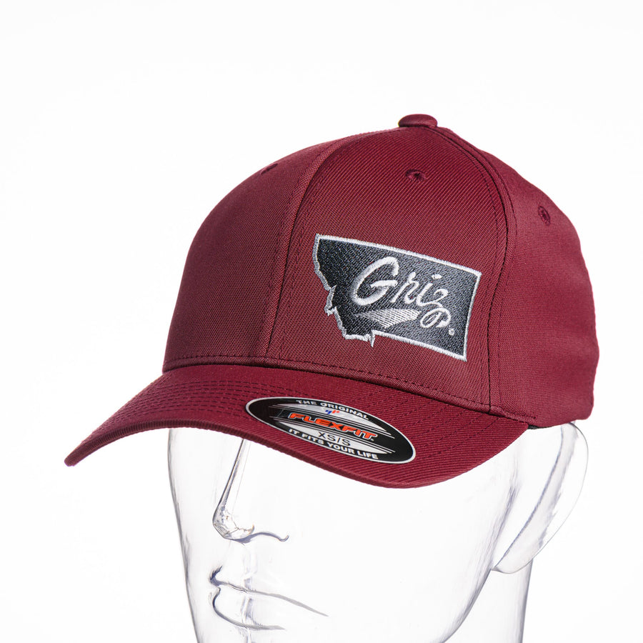 Blue Peaks Creative's maroon Performance Solid Cap embroidered with the Montana Griz Script in black and silver, front