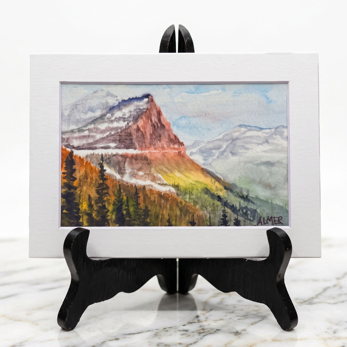ring alpine warmth home with the Sunshine and Snowfields 5x7 Matted Print by Stark Mountain Studio. Beautiful Montana watercolor art by Bobbe Almer.