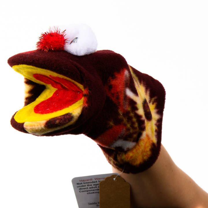 A plush hand puppet being worn on a person&