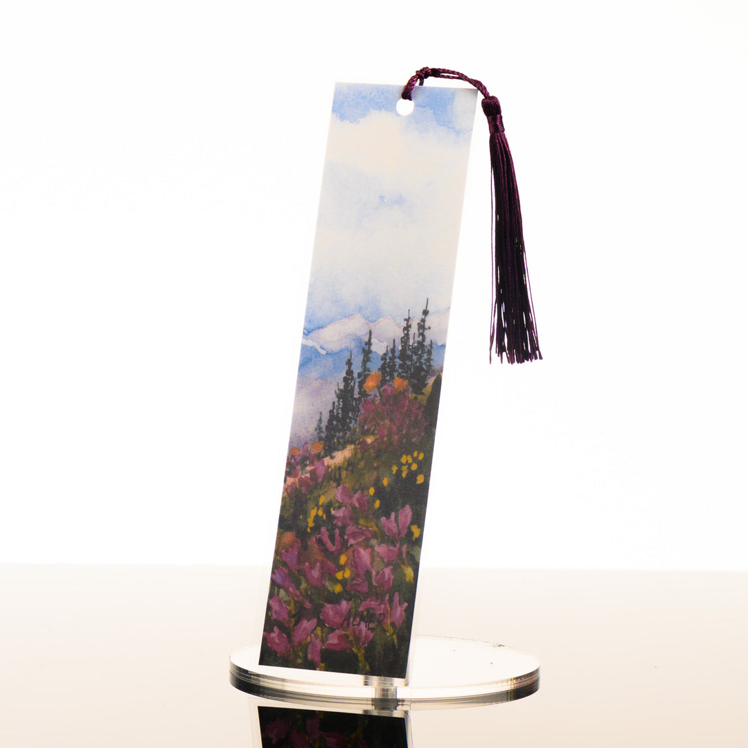 A Montana made watercolor bookmark featuring Montana wildflowers, by Stark Mountain Studio, featured in The Petals to Peaks Box by The Last Best Box.
