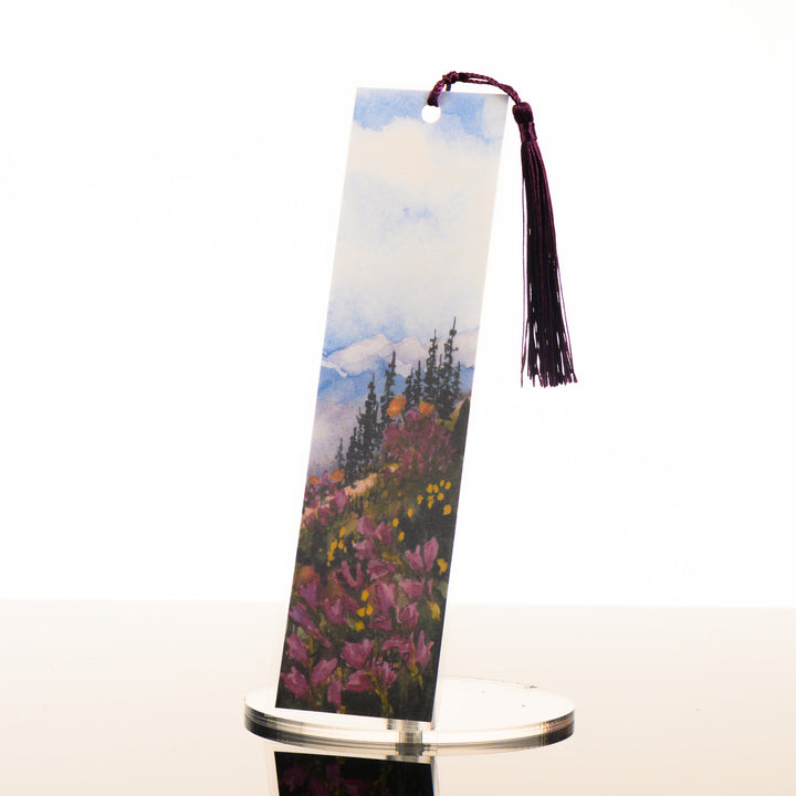 A Montana made watercolor bookmark featuring Montana wildflowers, by Stark Mountain Studio, featured in The Petals to Peaks Box by The Last Best Box.
