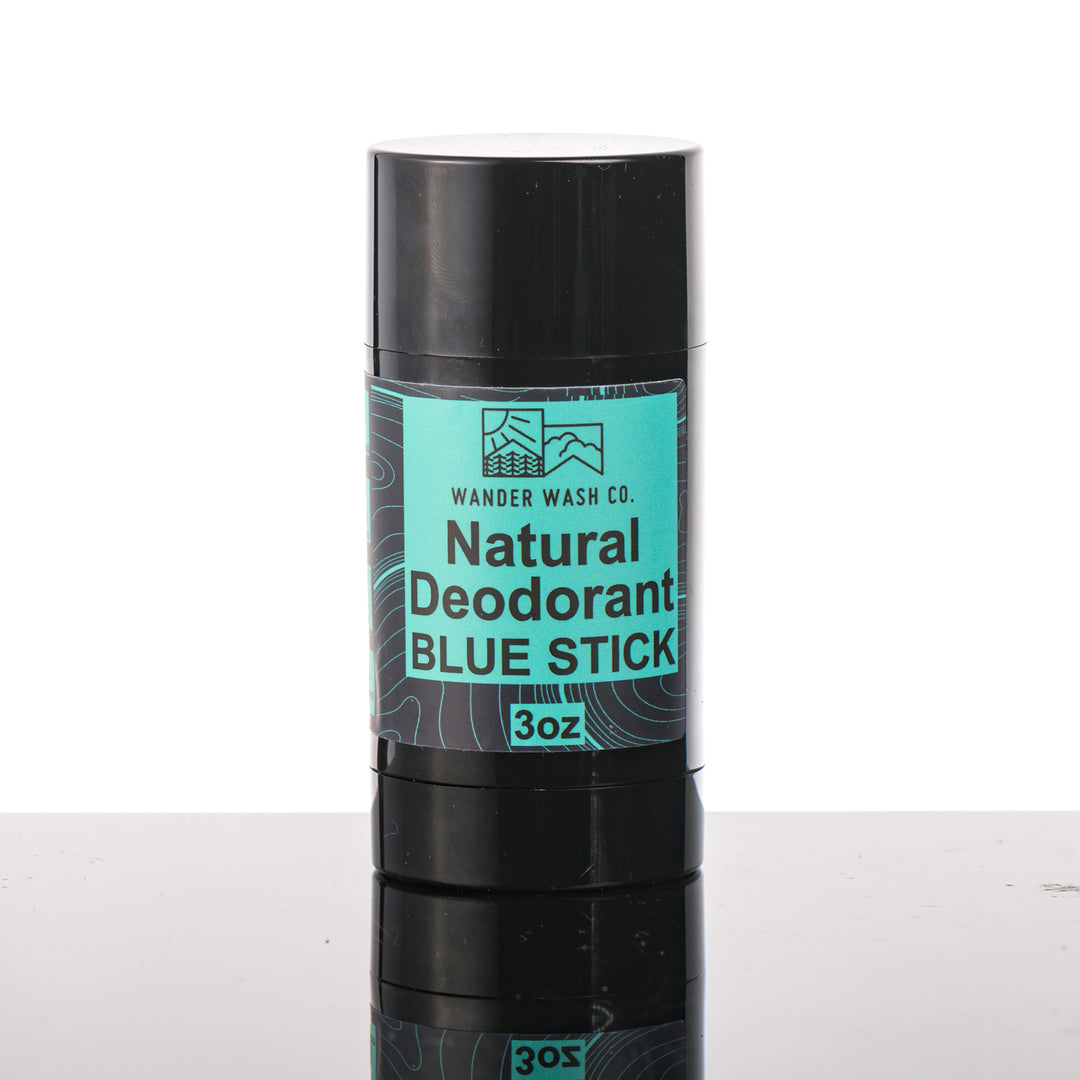 Front of a 3 oz tube of Natural Deodorant Blue Stick (bergamot, citrus, aromatic herbs) made in Montana by Wander Wash Co, against a white background