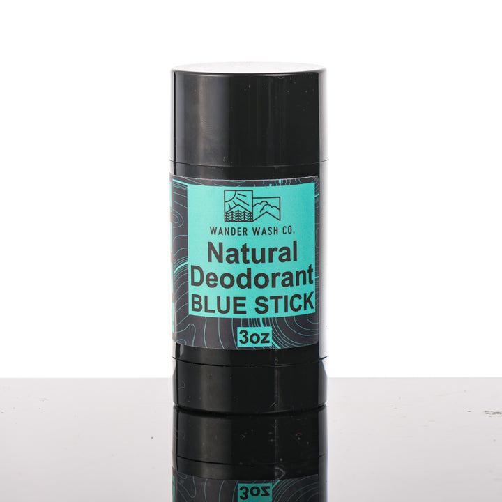 Front of a 3 oz tube of Natural Deodorant Blue Stick (bergamot, citrus, aromatic herbs) made in Montana by Wander Wash Co, against a white background