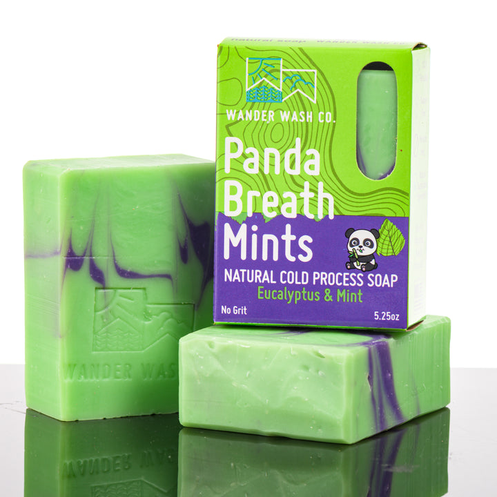 Display of three 5.25 oz bars of Panda Breath Mints Bar Soap, Natural Cold Process Soap (eucalyptus, mint)—one in the box and two out of the box--made in Montana by Wander Wash Co, against a white background