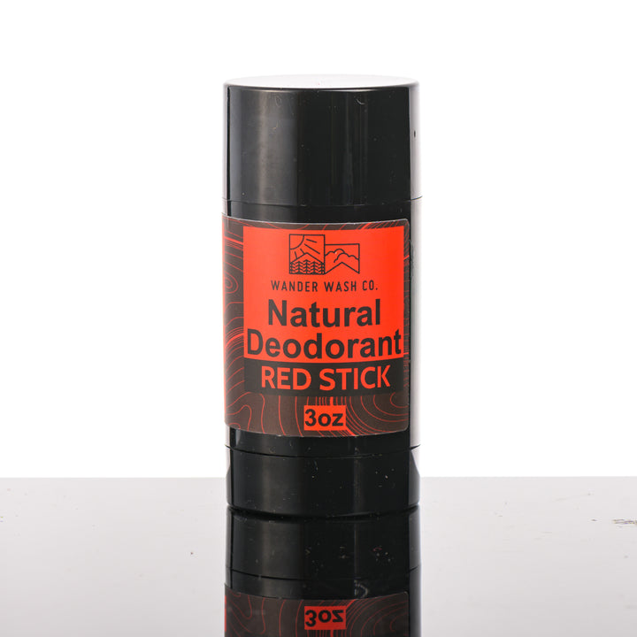 Front of a 3 oz tube of Natural Deodorant Red Stick (mint, amber, sandalwood, musk) made in Montana by Wander Wash Co, against a white background