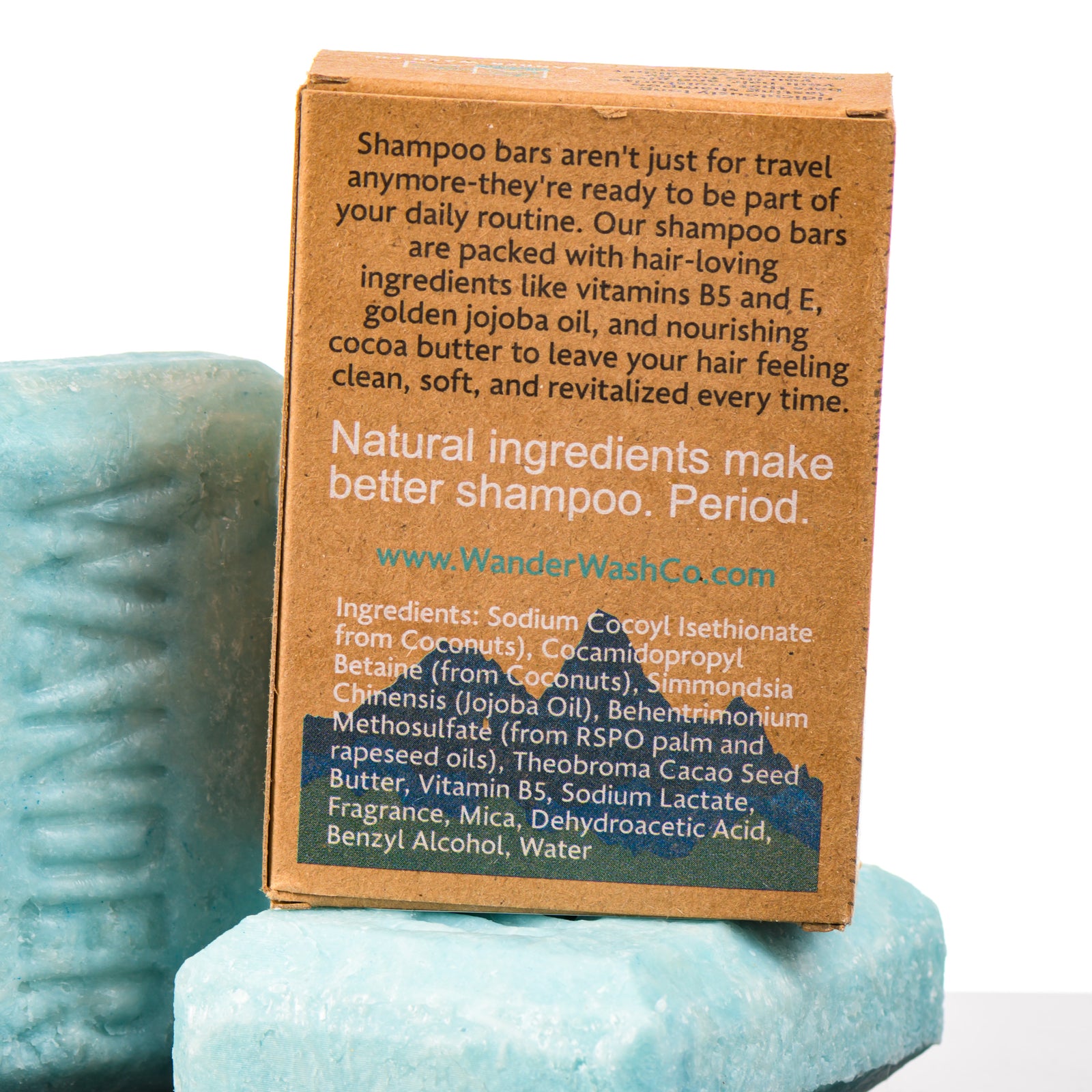 Display of three 4.5 oz bars of This Doesn’t Float Shampoo Bar (bergamot, fresh water)—one in the box and two out of the box--made in Montana by Wander Wash Co, focused on back (ingredients list) against a white background