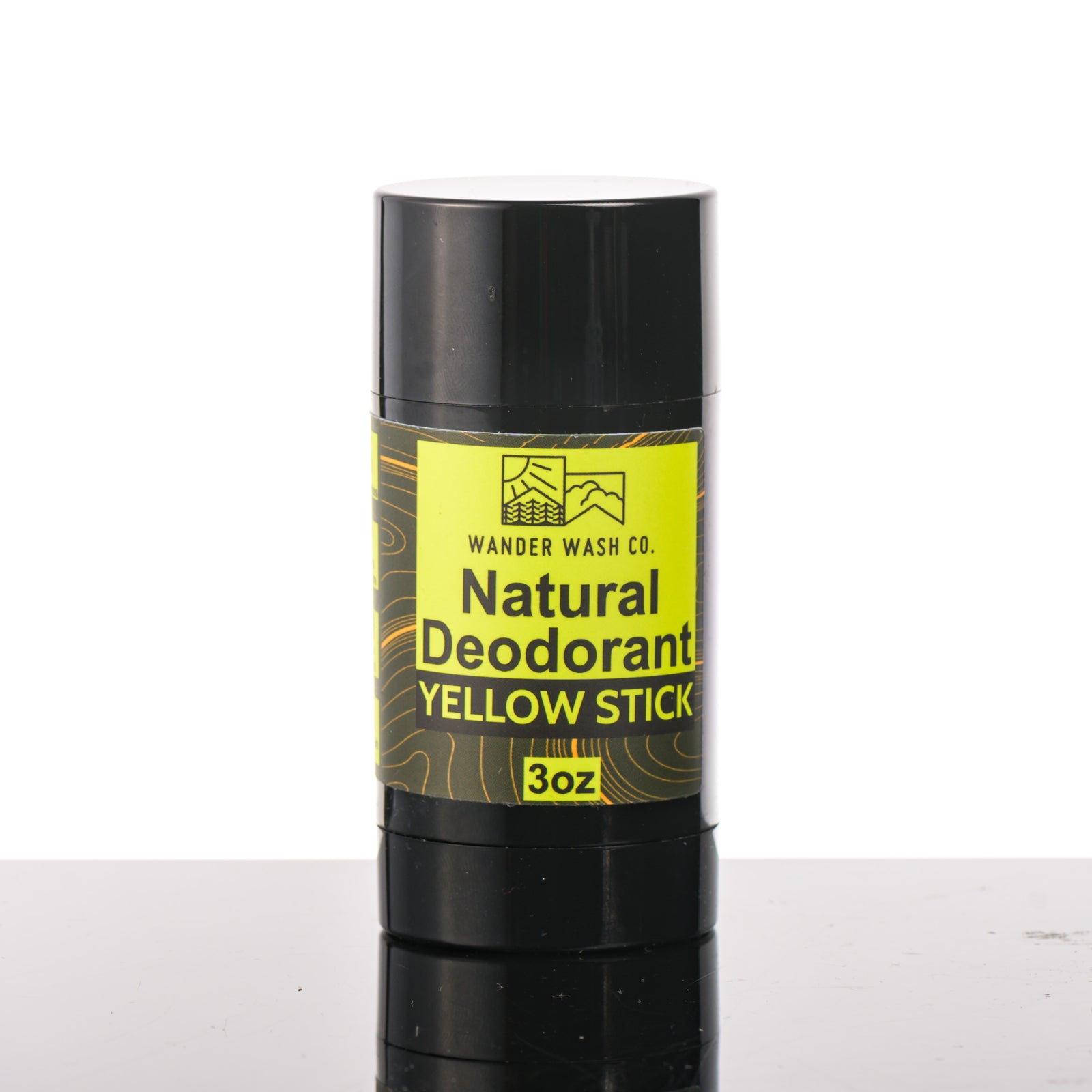 Front of a 3 oz tube of Natural Deodorant Yellow Stick (citrus, wood, moon cactus, and musk) made in Montana by Wander Wash Co, against a white background