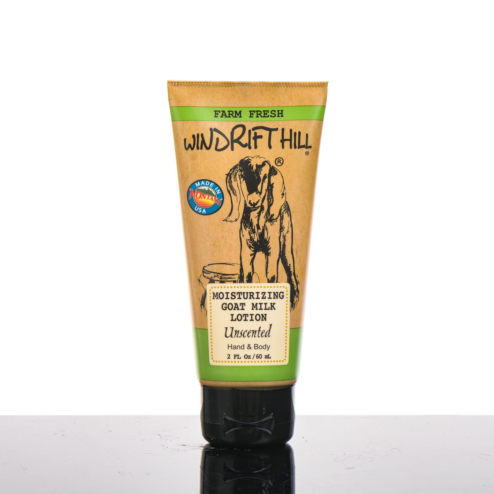 2 oz. bottle of Windrift Hill's Unscented Moisturizing Goat Milk Lotion, unscented goat’s milk body lotion handmade in Montana, USA