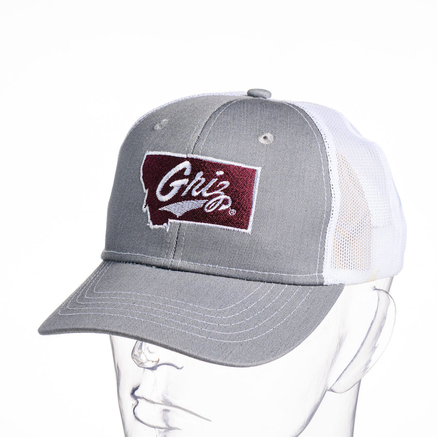 Blue Peaks Creative's grey and white Youth Snapback Trucker Cap embroidered with the Montana Griz Script in maroon and white, front