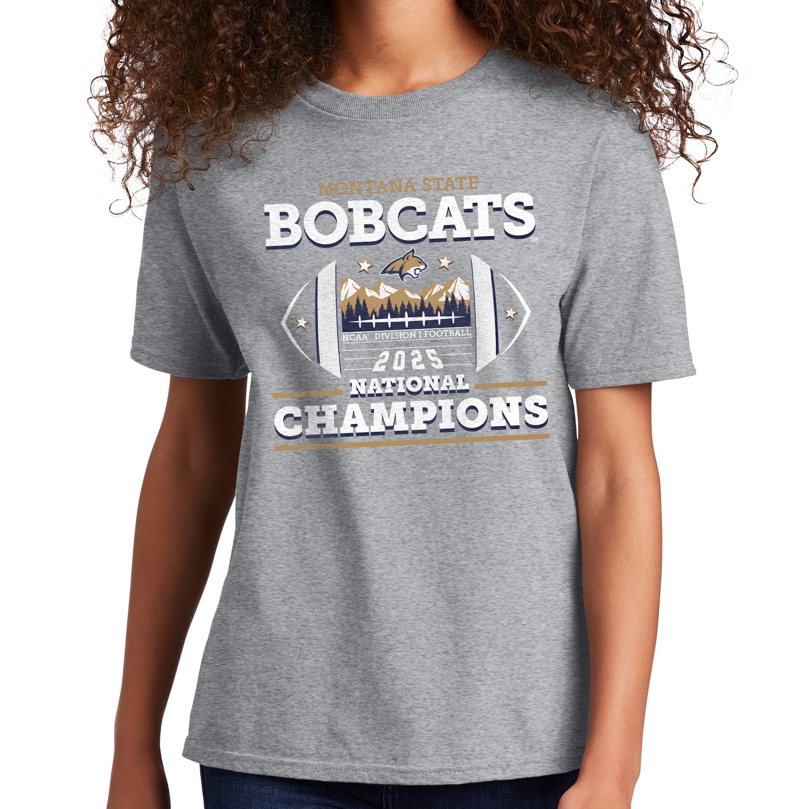 Gray youth t-shirt with 'Montana State Bobcats 2025 National Champions' text and graphics on a white background