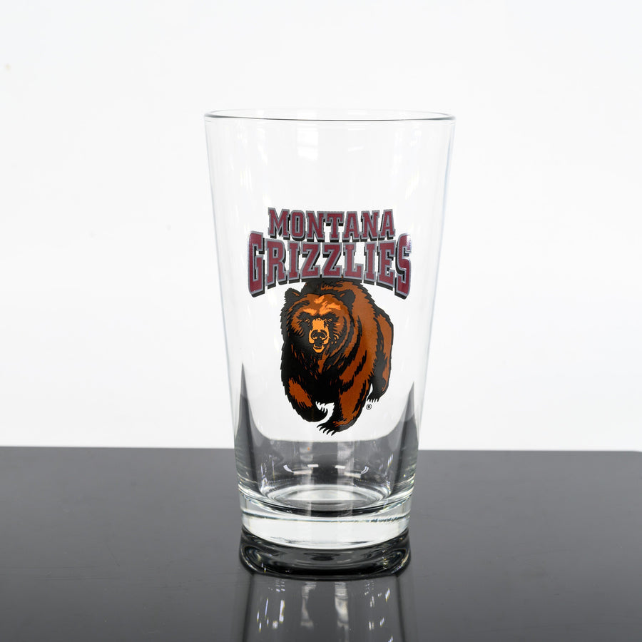 Blue Peaks Creative's Montana Grizzlies charging Bear Pint Glass