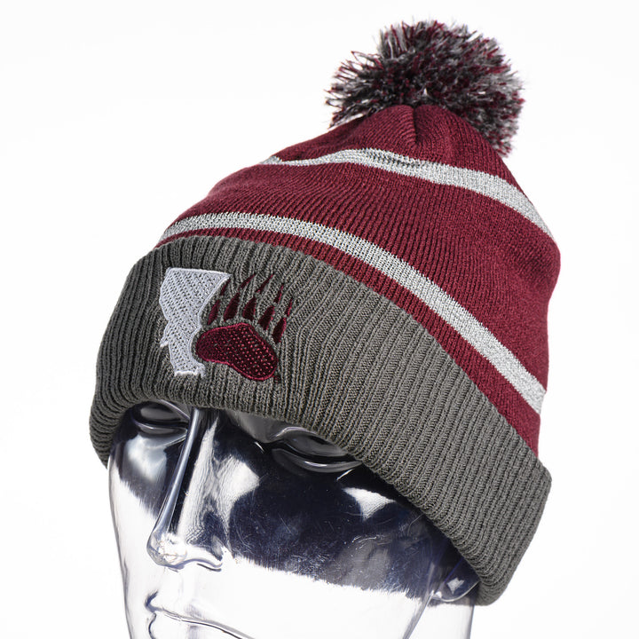 Blue Peaks Creative's Holloway Reflective Pom Beanie with the Montana and Grizzly Paw design, grey and maroon